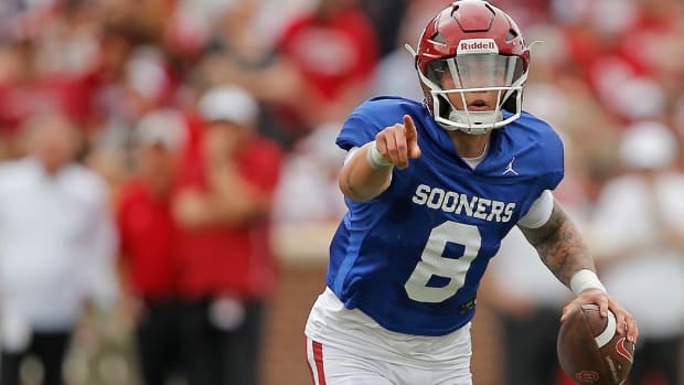 OU quarterback Dillon Gabriel scrambles during the Sooners’ spring game on April 23 at Gaylord Family-Oklahoma Memorial Stadium in Norman.